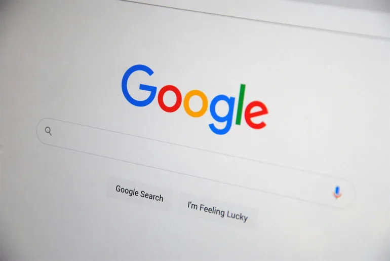 Small business owner reviewing their Google Business Profile on a laptop